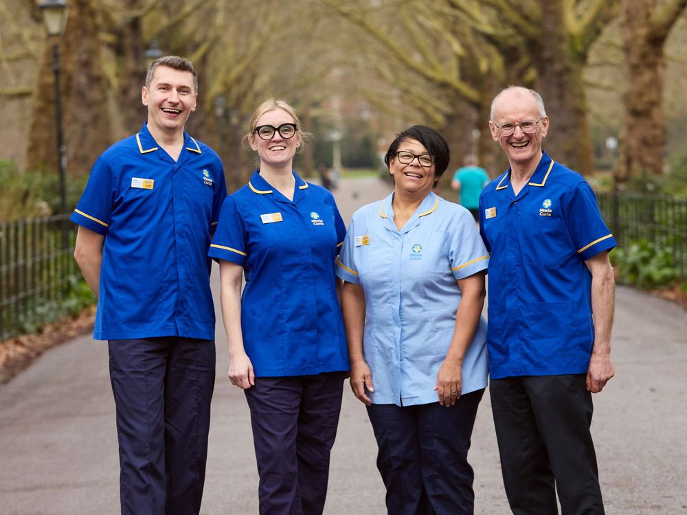 To The End Team of nursing staff standing in uniform
