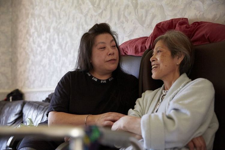 Elaine and her mum at home