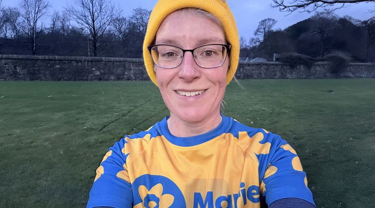 Alisa Winters in a Marie Curie running top