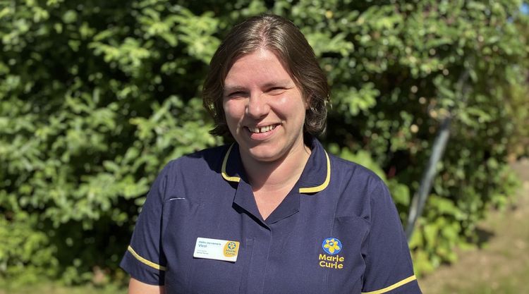 Marie Curie Clinical Nurse Specialist, Vicci Spires, smiling in uniform