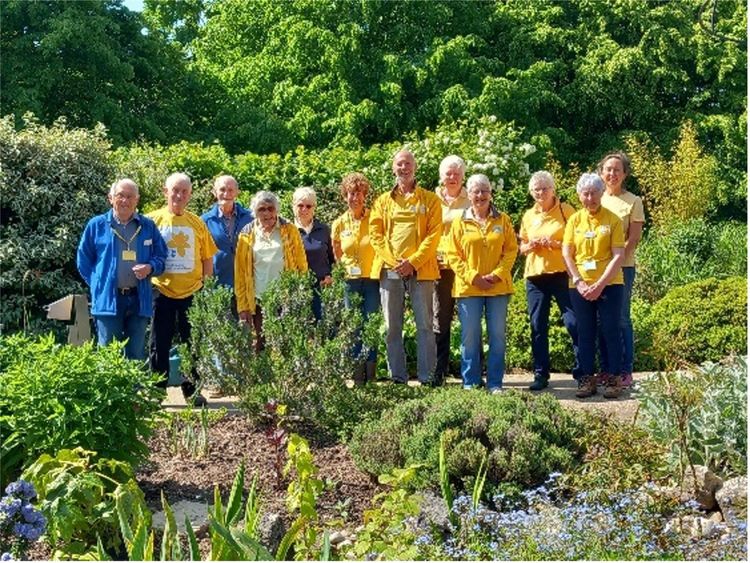 Marie Curie Hospice staff in a garden